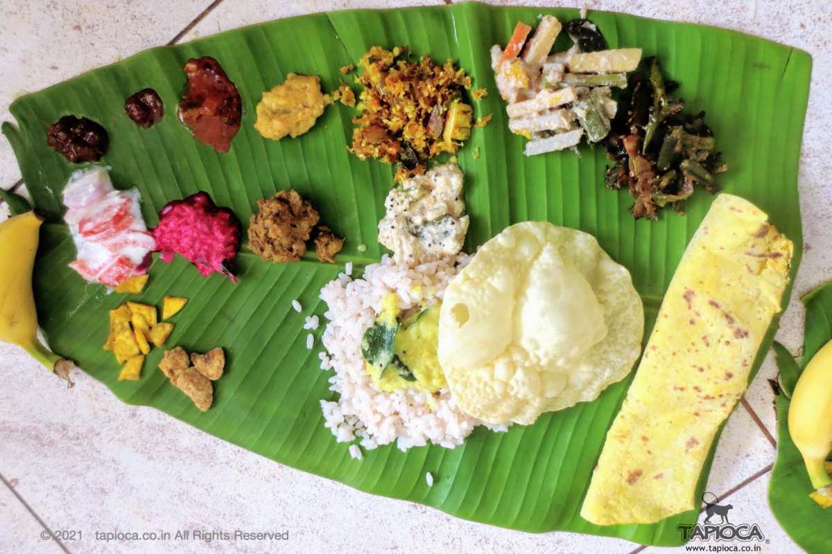 Meal called Sadhya served on plantain leaf