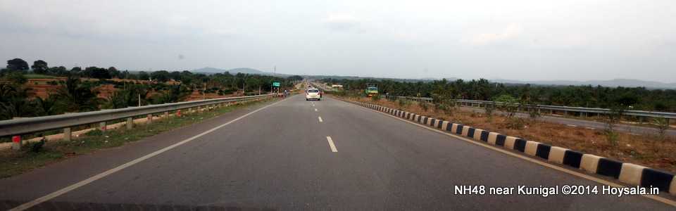 Take NH48 to Hassan, from where take the diversion for Belur and Halebid