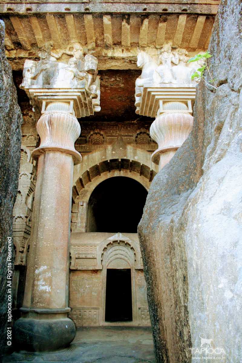 Pillar in the porch of the Chaitya with carved capitals