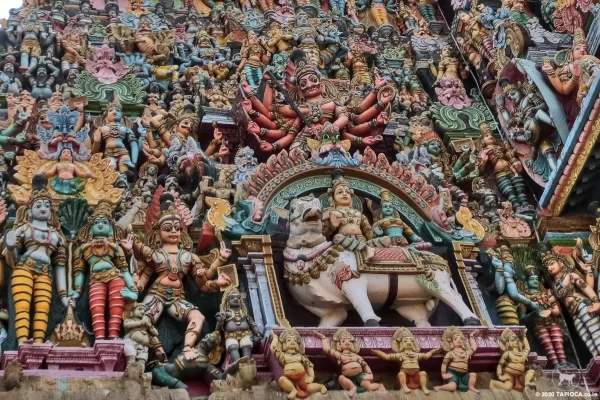 Brightly painted stucco images on the temple towers at Tamilnadu