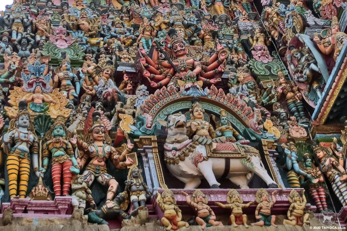 Brightly painted stucco images on the temple towers at Tamilnadu