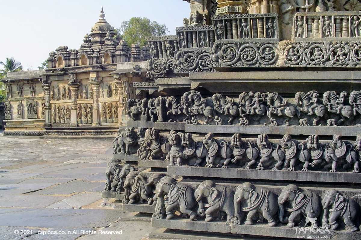 Friezes on the outer wall of the temple in Belur .