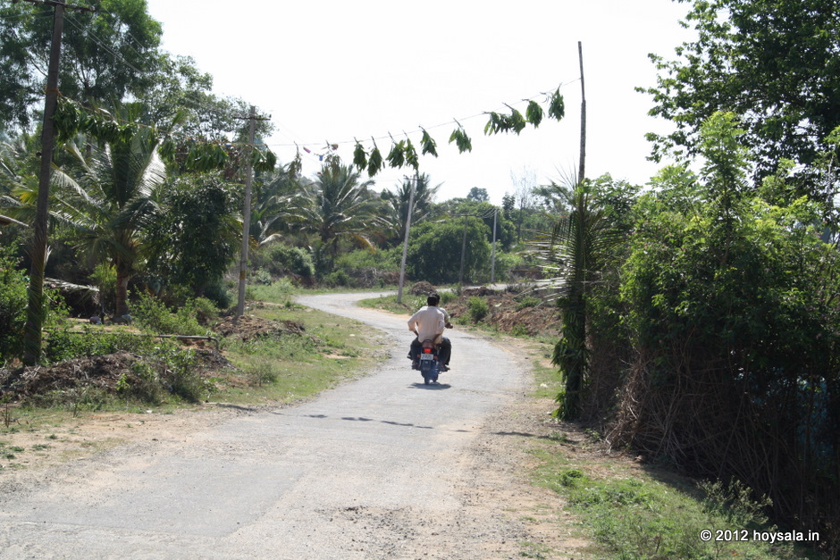 You'll take this village road from the highway to reach the temple.