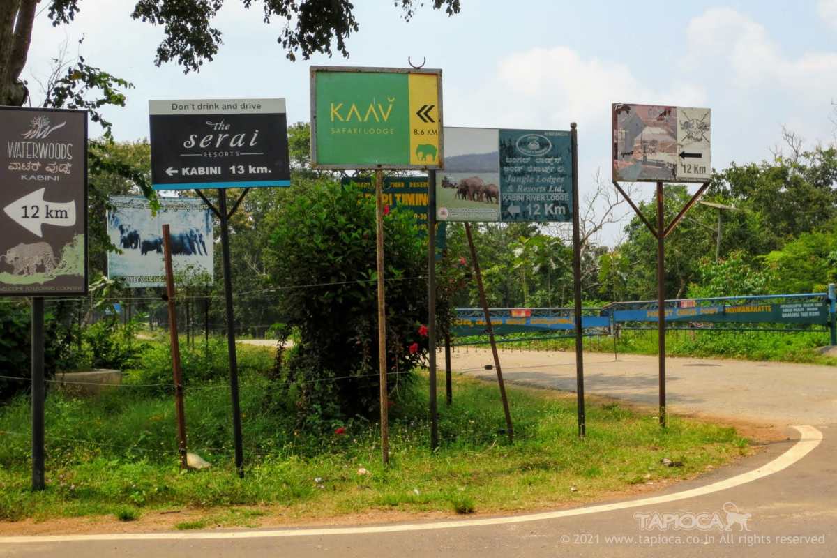 Most of these resorts like JLR, Serai, KAAV Safari Lodge are around the Karapura village, so 12km from this diversion. You can also see the closed gate across the road into the Nagarhole forest.  