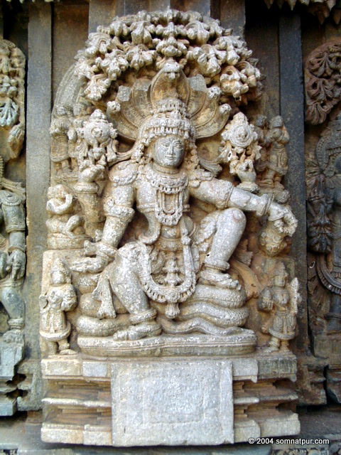 Lord Vishnu sitting on the coiled snake , Somnathpur, Karnataka