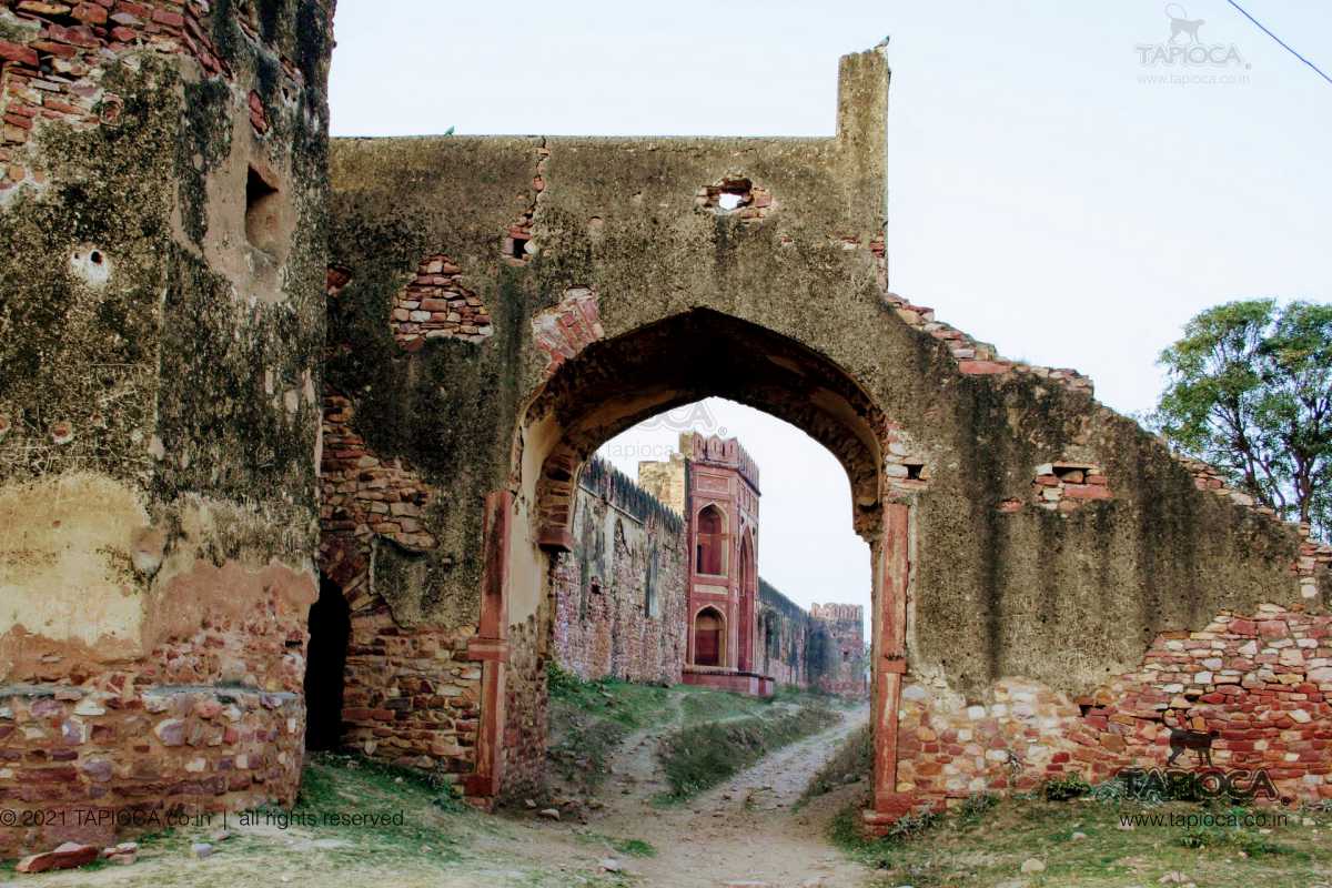 Gateway to Caravanserai, an upscale traveller's inn of the city's hay days. The dirt track seen goes around the ruins of Fatehpur Sikri