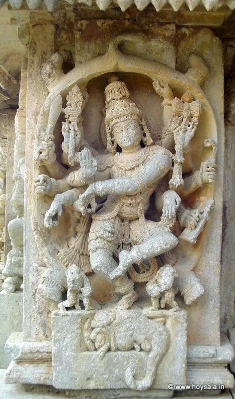 Gajasurasamhara: Shiva dancing inside the skin of the slain elephant. Note the four legs, tail and the head of the elephant.