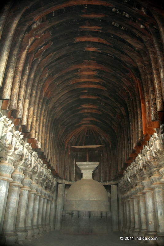 Stupa and the pillars in the Chaitra Hall of Karla Caves. Note the wooden arches in the ceiling, that is believed to be 2500 years old!