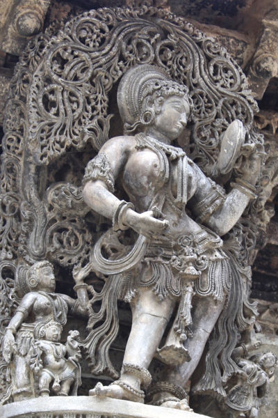 Lady with Mirror at Belur. This Masterpiece at Belur is often boasted to be the highest watermark of the Hoysala art.