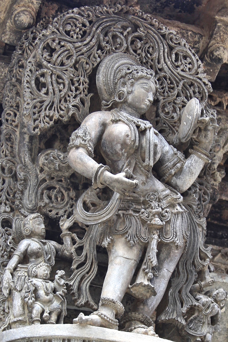 Lady with Mirror at Belur. This Masterpiece at Belur is often boasted to be the highest watermark of the Hoysala art. 