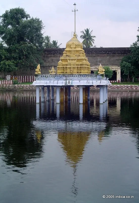 Garuda, the mount of Lord Vishnu, carrying Vishnu. 
