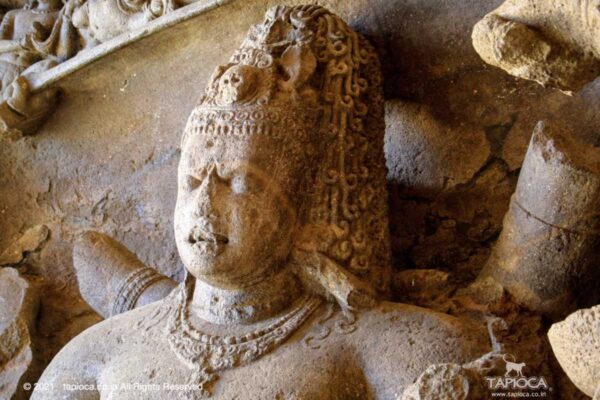 The ferocious expression of Shiva in the Andhakasura Vadha panel stands in stark contrast with the aspects depicted in other panels.