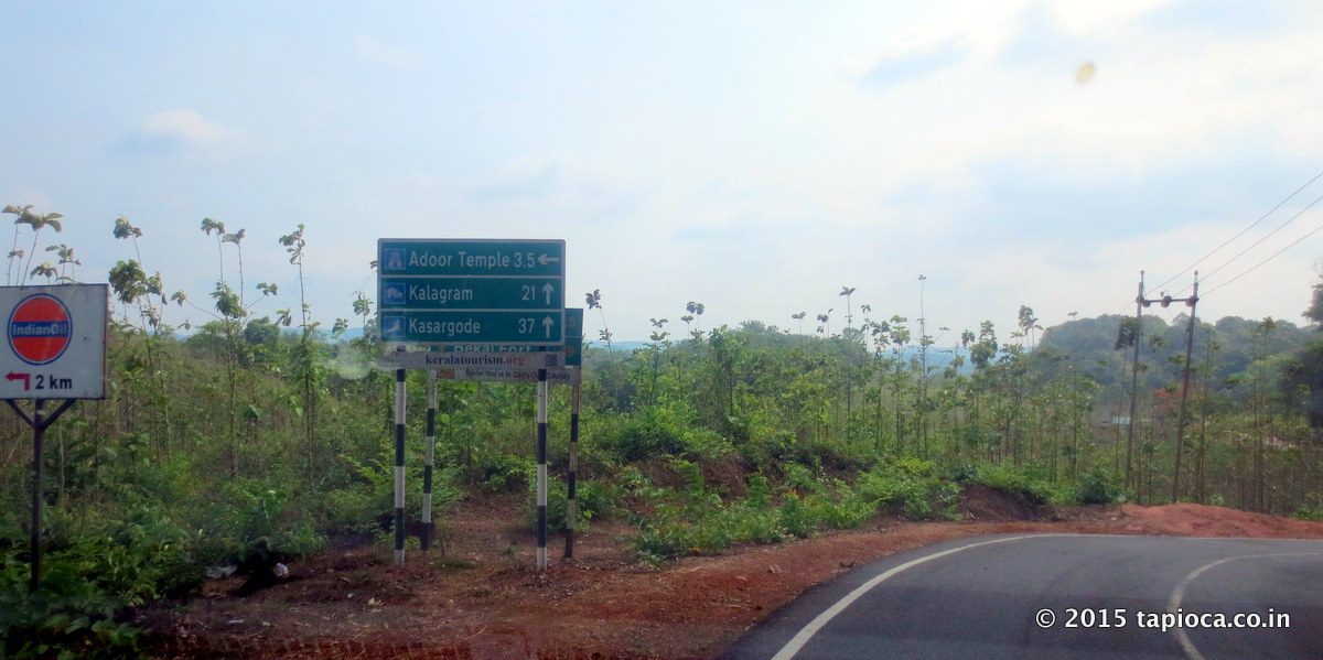 A signpost on the Jalsoor(Karnataka)-Cherkala (Kerala) road. The Adoor village is a short detour from the main road. 