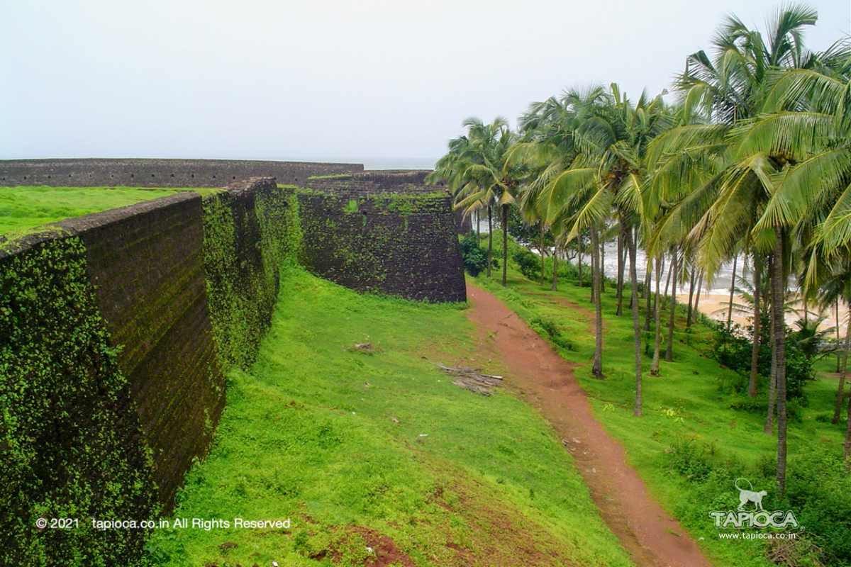 Trail outside the Bekal Fort. Beach is beyond the coconut palms.